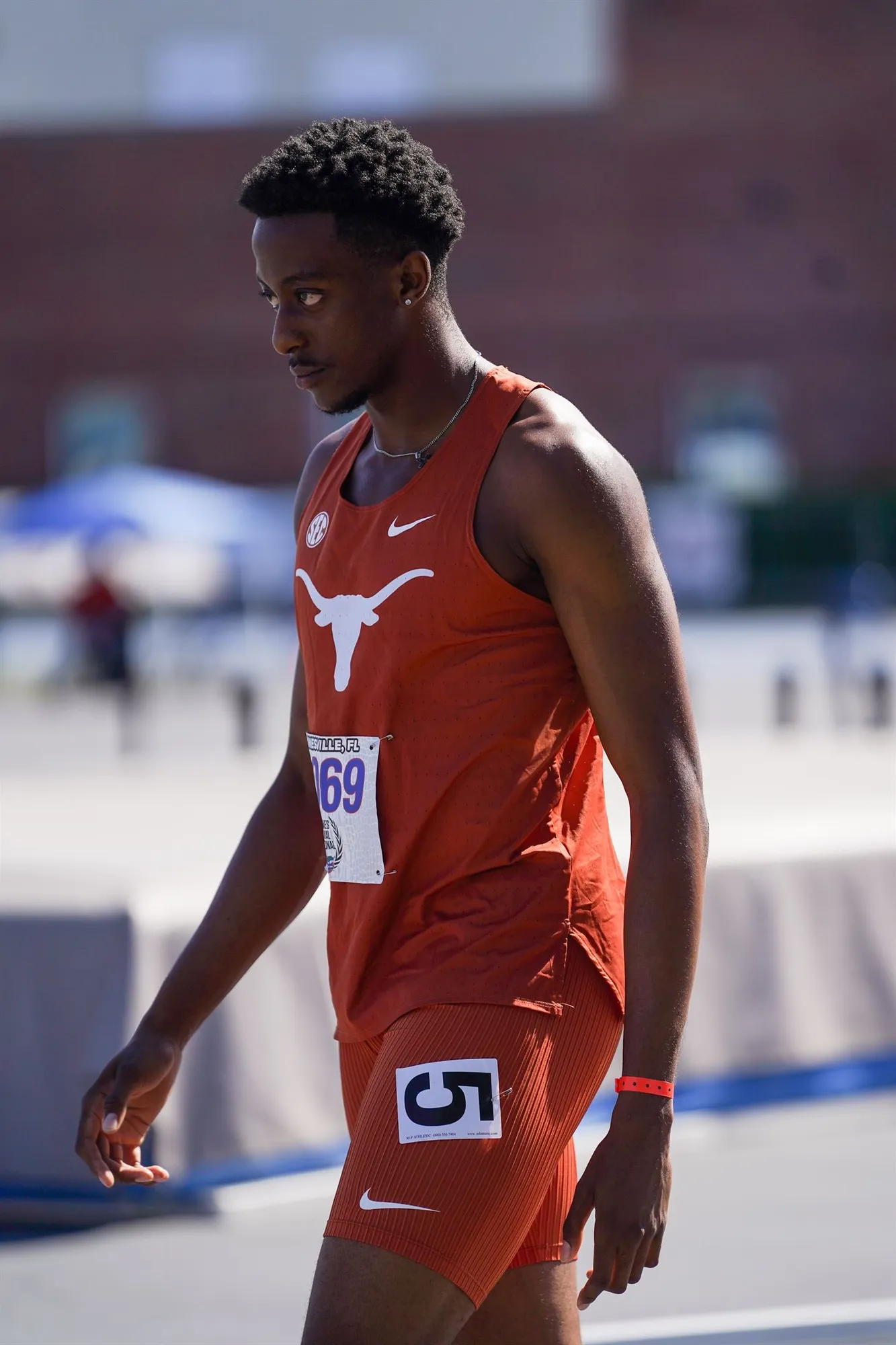 Sihle in the Texas kit walking off the track