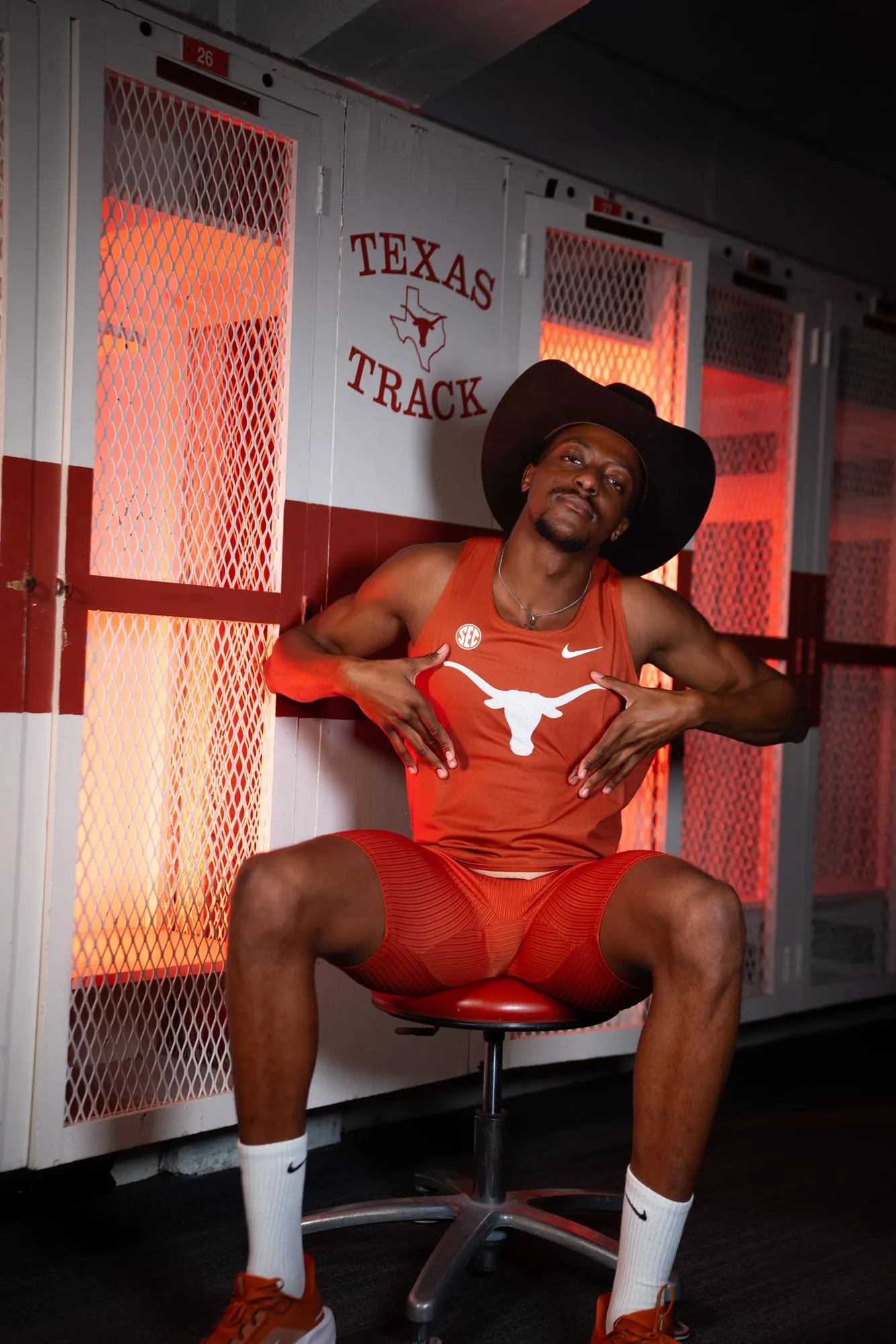 Sihle in a cowboy hat in the Texas Track locker room